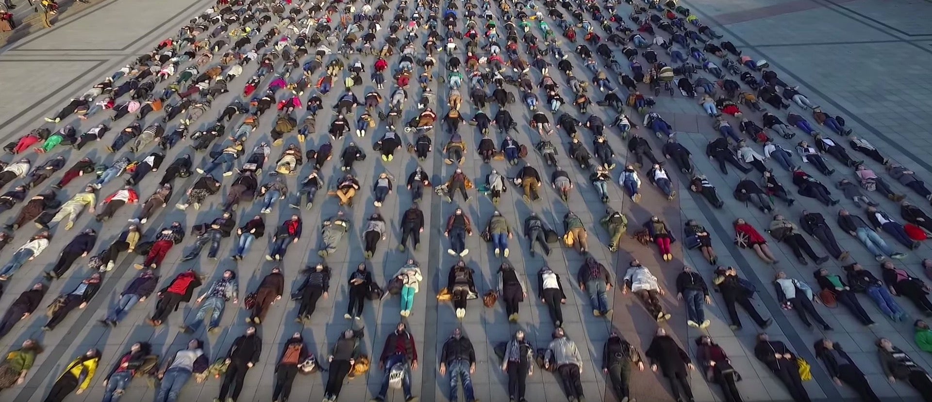 Powerful photographs of Lithuanians staging mass lie-down to demonstrate country’s disproportionate suicide rate
